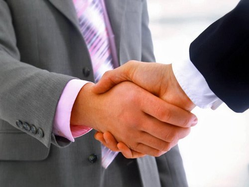Lawyers shake hands in California